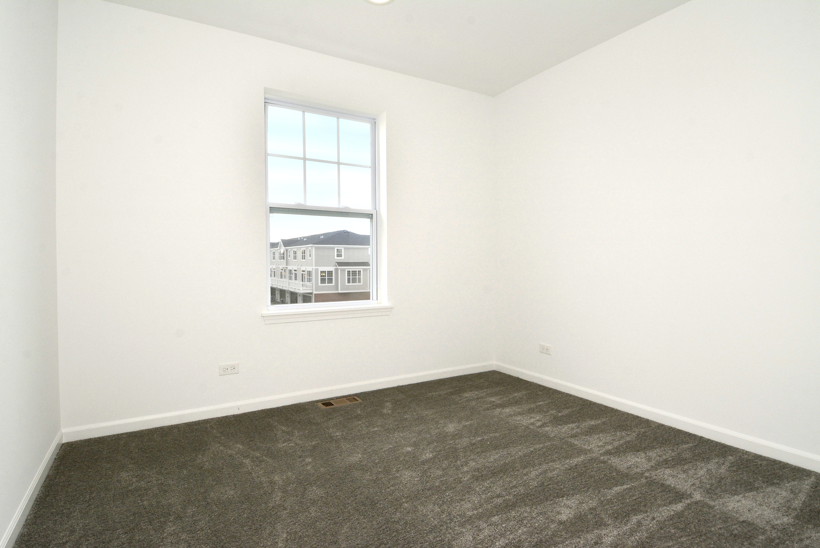 202 Timberleaf Circle Roselle, IL 60172 - Photo 15 of 22 an empty room with a window