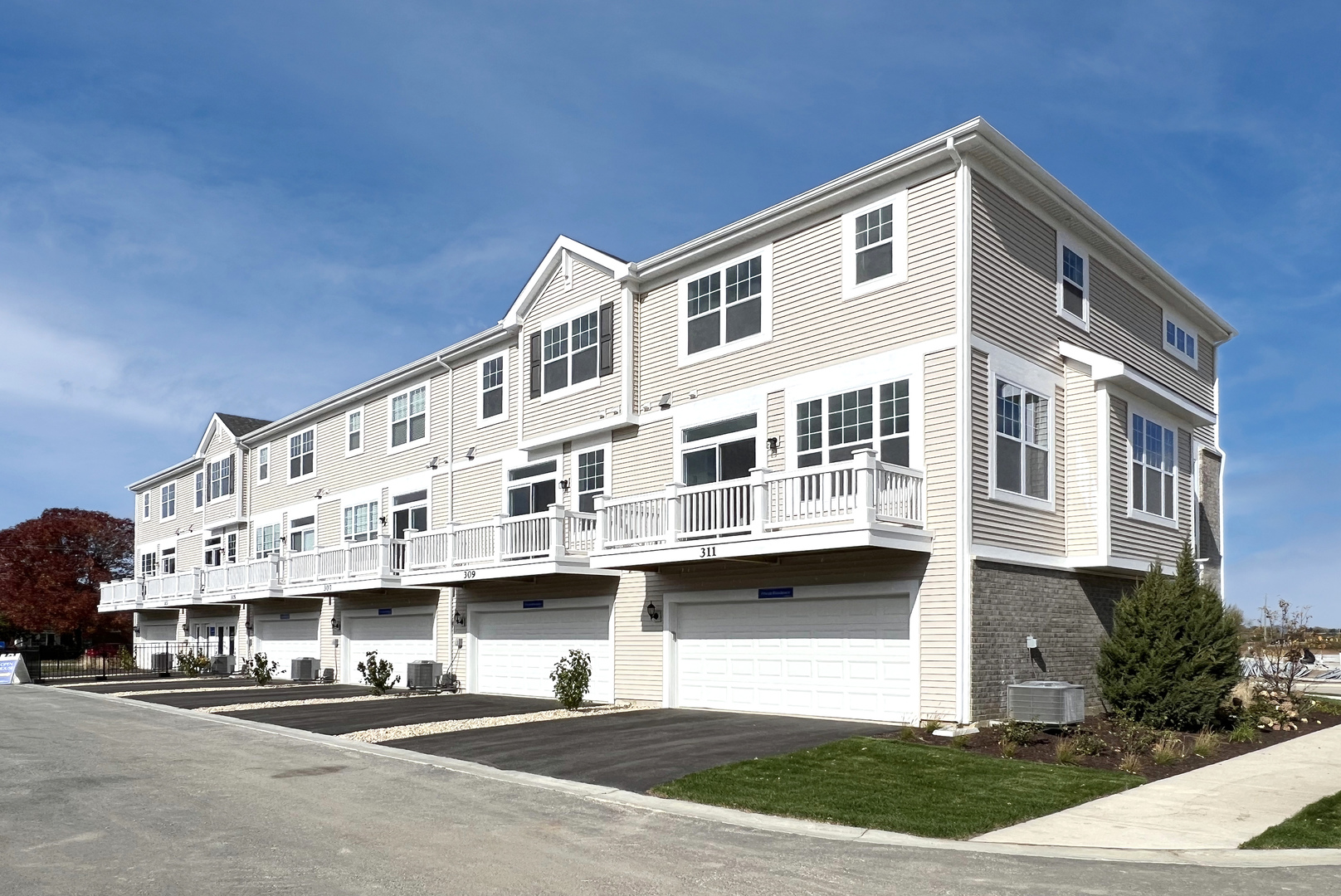 202 Timberleaf Circle Roselle, IL 60172 - Photo 22 of 22 a front view of a building with a garden