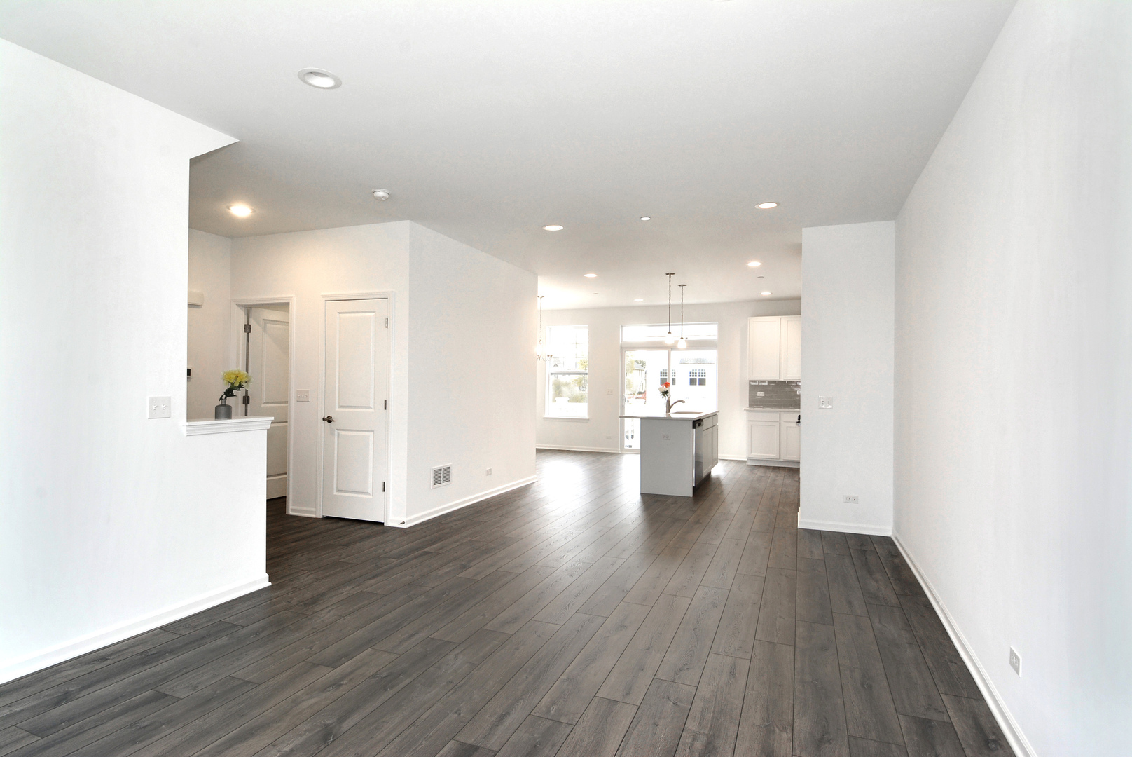 202 Timberleaf Circle Roselle, IL 60172 - Photo 4 of 22 a view of a kitchen with a refrigerator and a sink