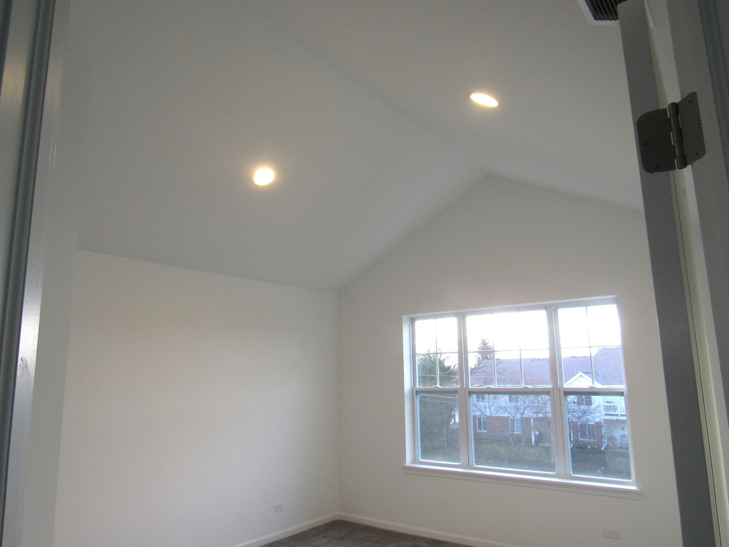 202 Timberleaf Circle Roselle, IL 60172 - Photo 9 of 22 an empty room with windows and city view