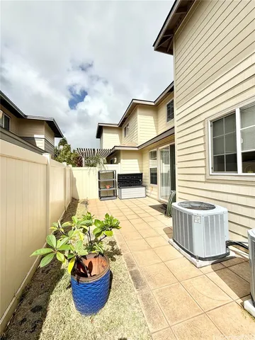 a front view of a house with a patio