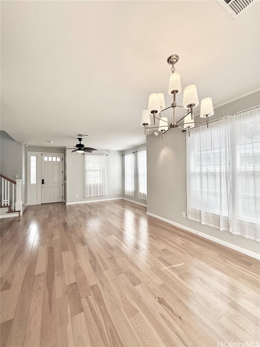 580 Lunalilo Home Road, Unit B340 Honolulu, HI 96825 - Photo 4 of 21 a view of a livingroom with wooden floor