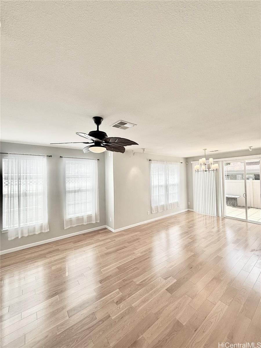 580 Lunalilo Home Road, Unit B340 Honolulu, HI 96825 - Photo 5 of 21 wooden floor in an empty room with a window