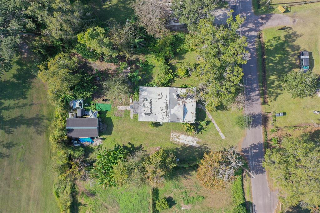 3346 Strickland Road Lakeland, FL 33810 - Photo 13 of 16 an aerial view of a house with a yard