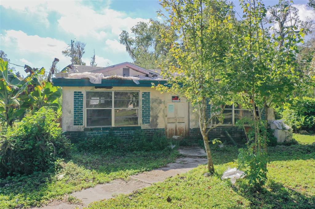 3346 Strickland Road Lakeland, FL 33810 - Photo 15 of 16 a view of a house with backyard and garden