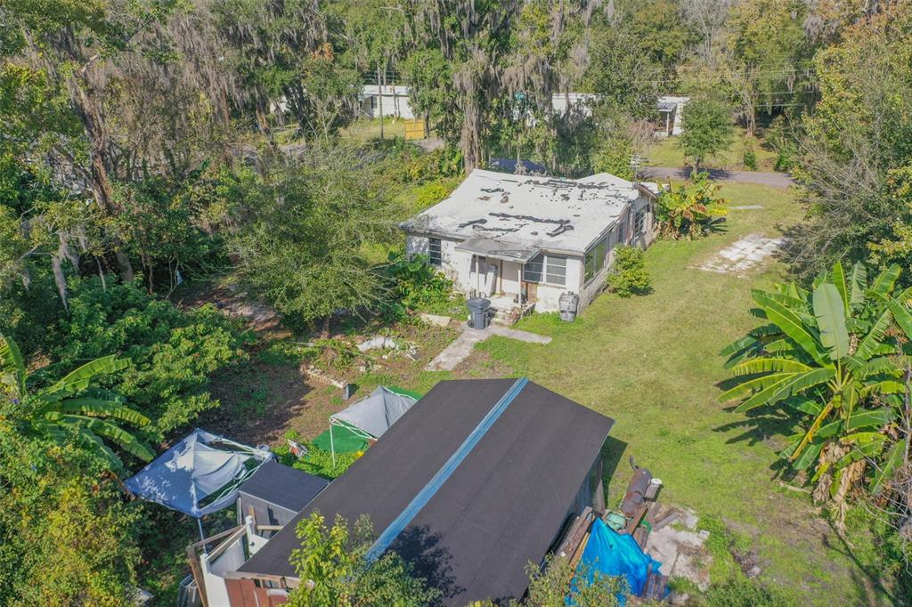 3346 Strickland Road Lakeland, FL 33810 - Photo 9 of 16 an aerial view of a house with yard swimming pool and outdoor seating