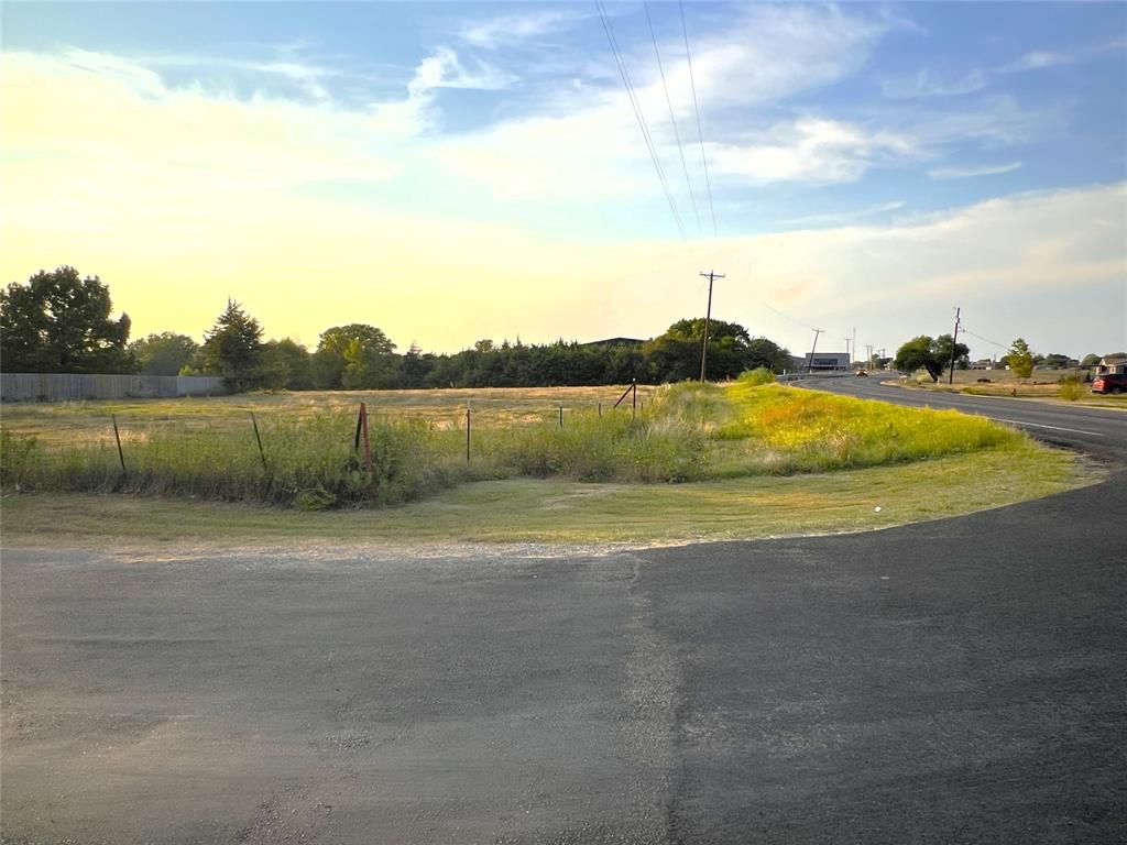Tbd Harper Road Ferris, TX 75125 - Photo 2 of 12 a view of swimming pool with lake and houses in the back