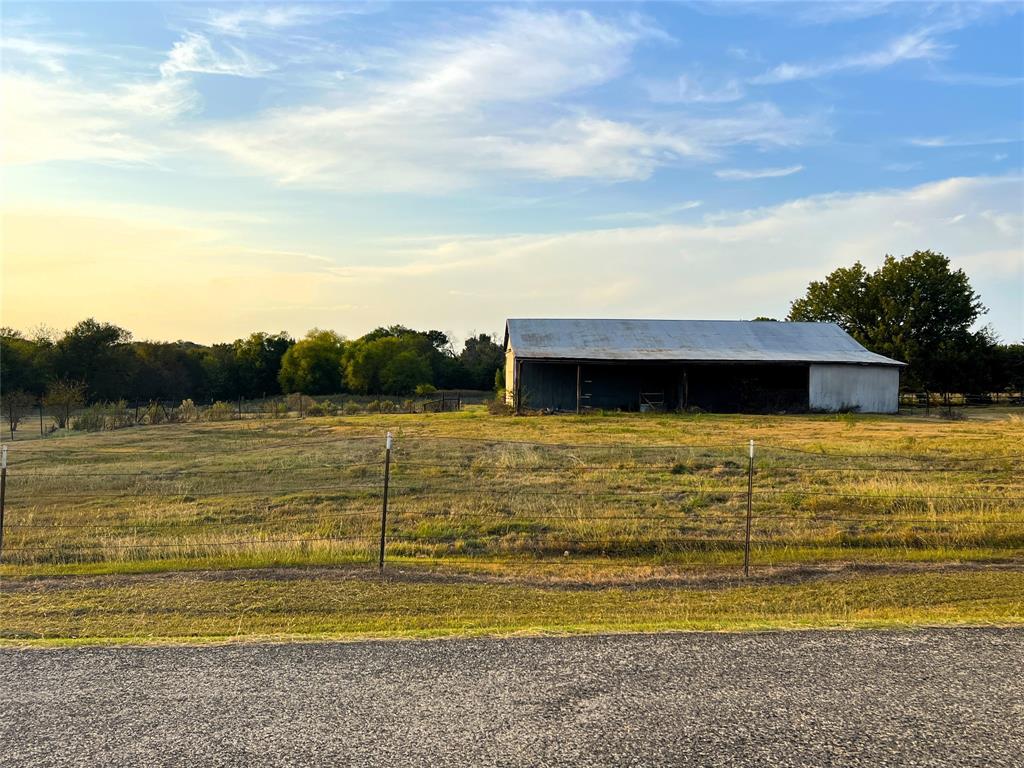 Tbd Harper Road Ferris, TX 75125 - Photo 3 of 12 a view of a swimming pool and an outdoor seating