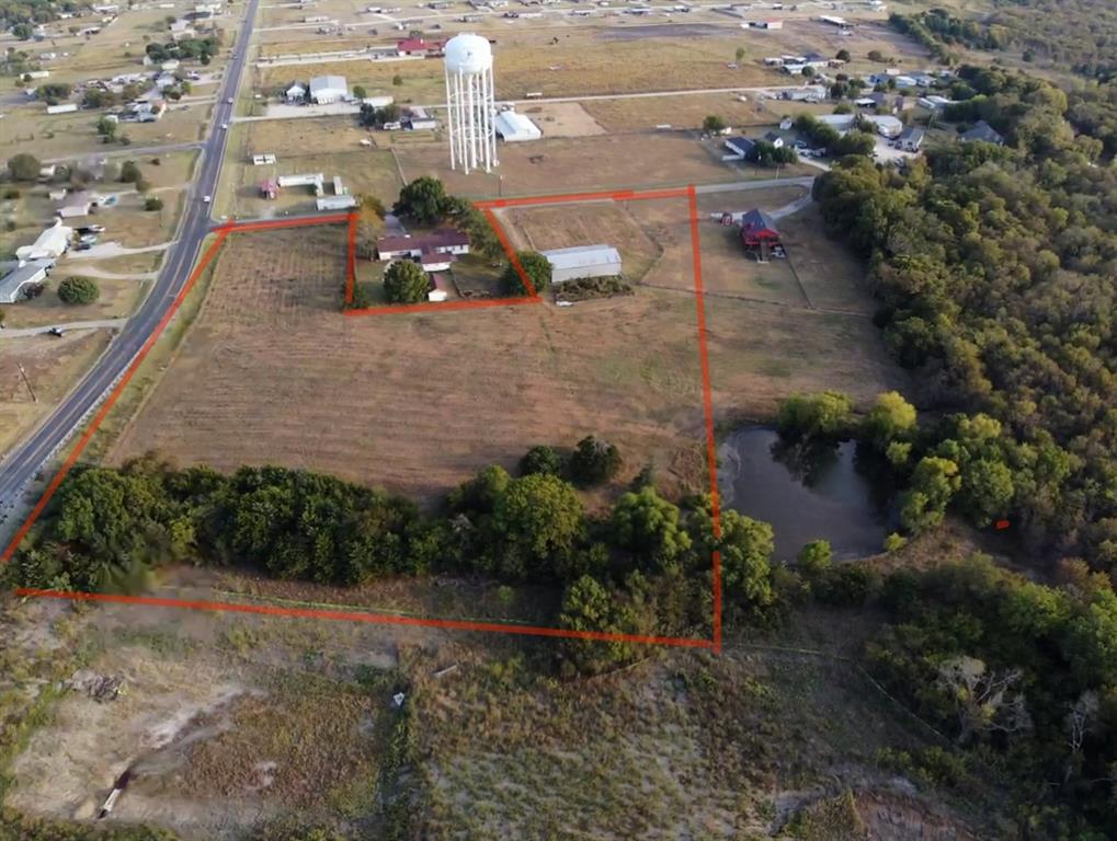 Tbd Harper Road Ferris, TX 75125 - Photo 5 of 12 an aerial view of a house with a yard