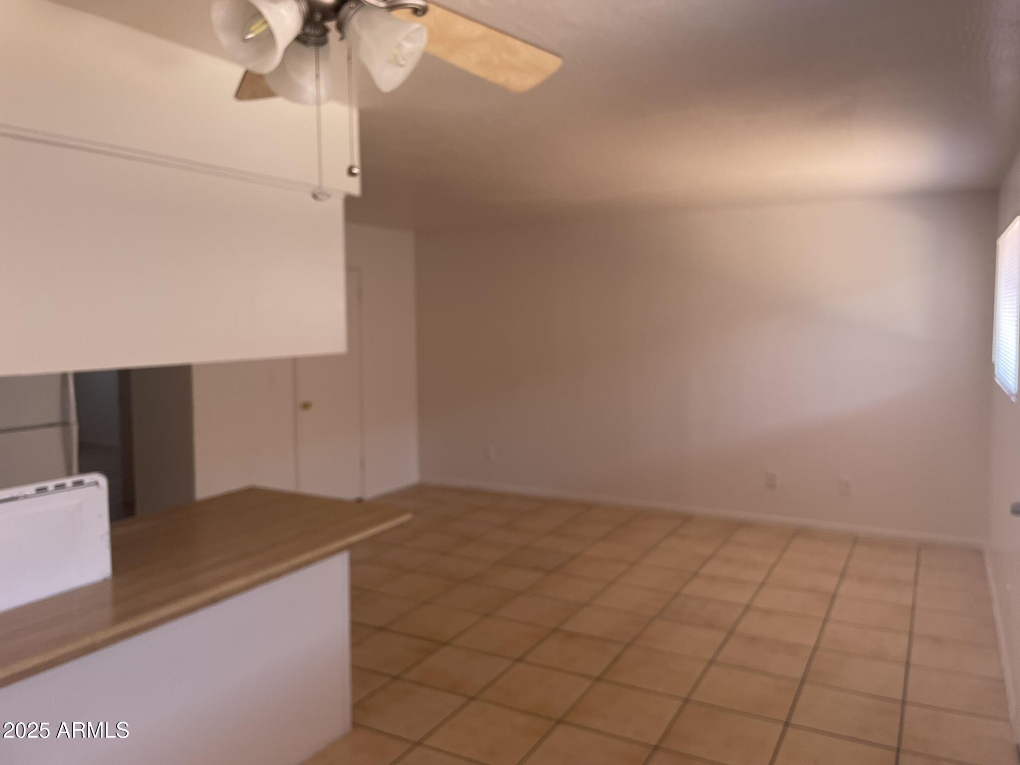2002 East Sweetwater Avenue, Unit 108 Phoenix, AZ 85022 - Photo 3 of 25 a view of an empty room