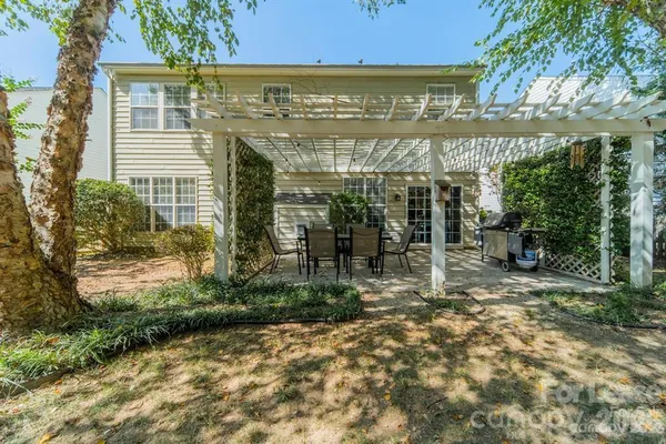 a view of a building with a garden