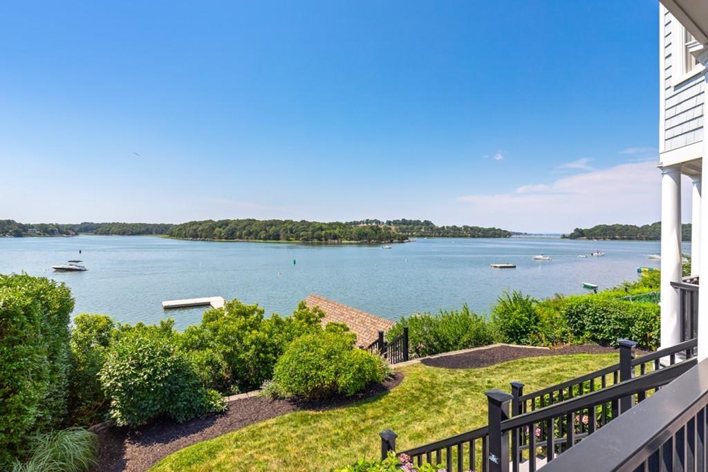 67 Hampton Circle Hull, MA 02045 - Photo 18 of 38 a view of a lake with a big yard