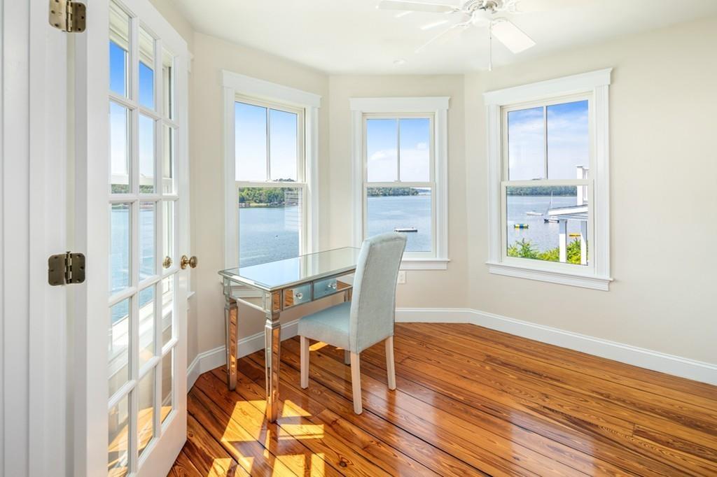 67 Hampton Circle Hull, MA 02045 - Photo 27 of 38 a view of a dining room with furniture and wooden floor