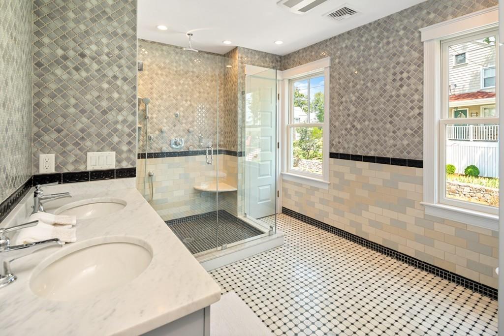 67 Hampton Circle Hull, MA 02045 - Photo 31 of 38 a bathroom with a sink a toilet and a shower