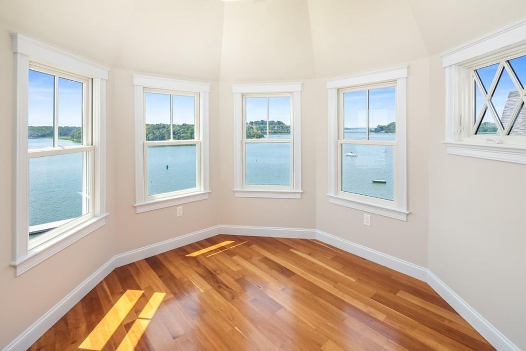 67 Hampton Circle Hull, MA 02045 - Photo 35 of 38 a view of a bedroom with wooden floor and a window