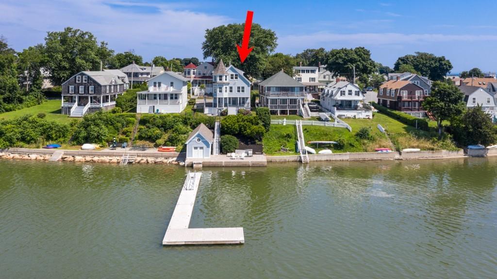 67 Hampton Circle Hull, MA 02045 - Photo 37 of 38 an aerial view of residential houses with outdoor space and lake view