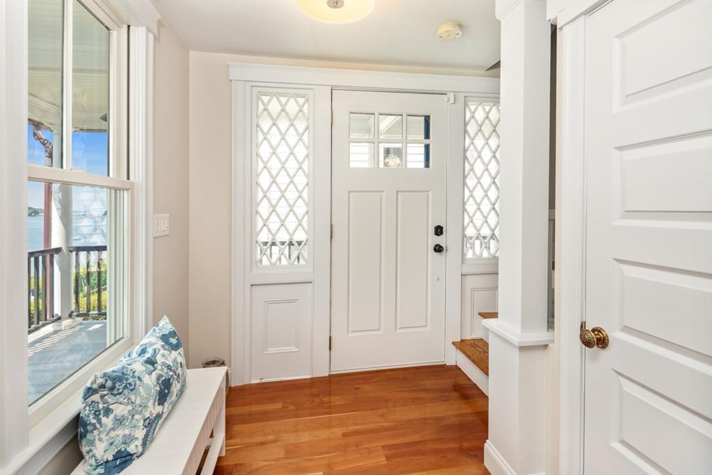 67 Hampton Circle Hull, MA 02045 - Photo 6 of 38 a bedroom with windows and entrance