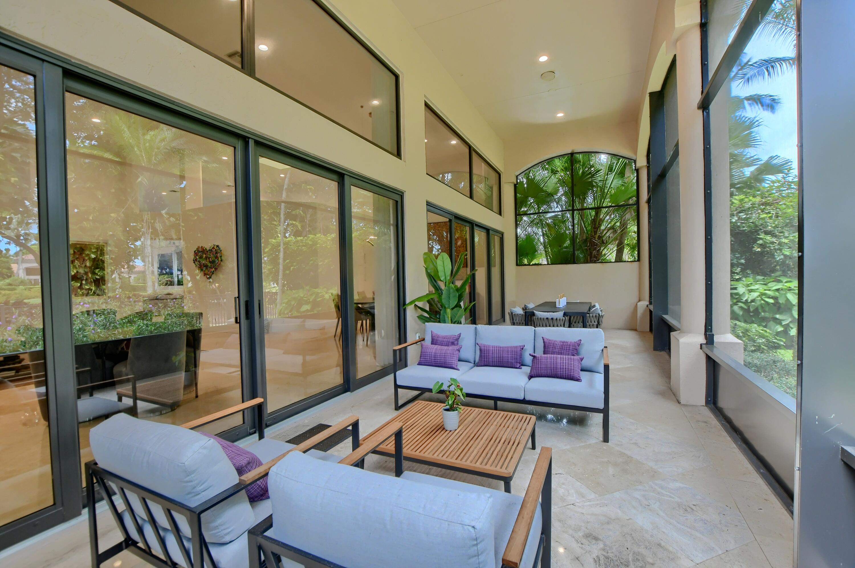 5894 Northwest 25th Court Boca Raton, FL 33496 - Photo 11 of 46 screened-in lanai
