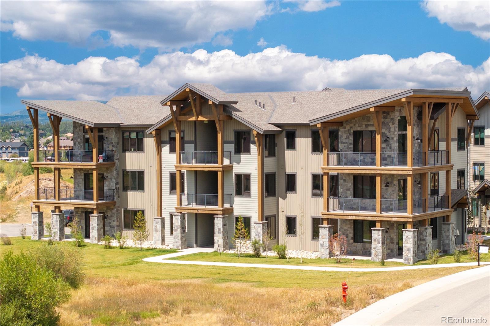 96 Meadow Trail, Unit G304 Fraser, CO 80442 - Photo 11 of 38 a front view of a multi story building