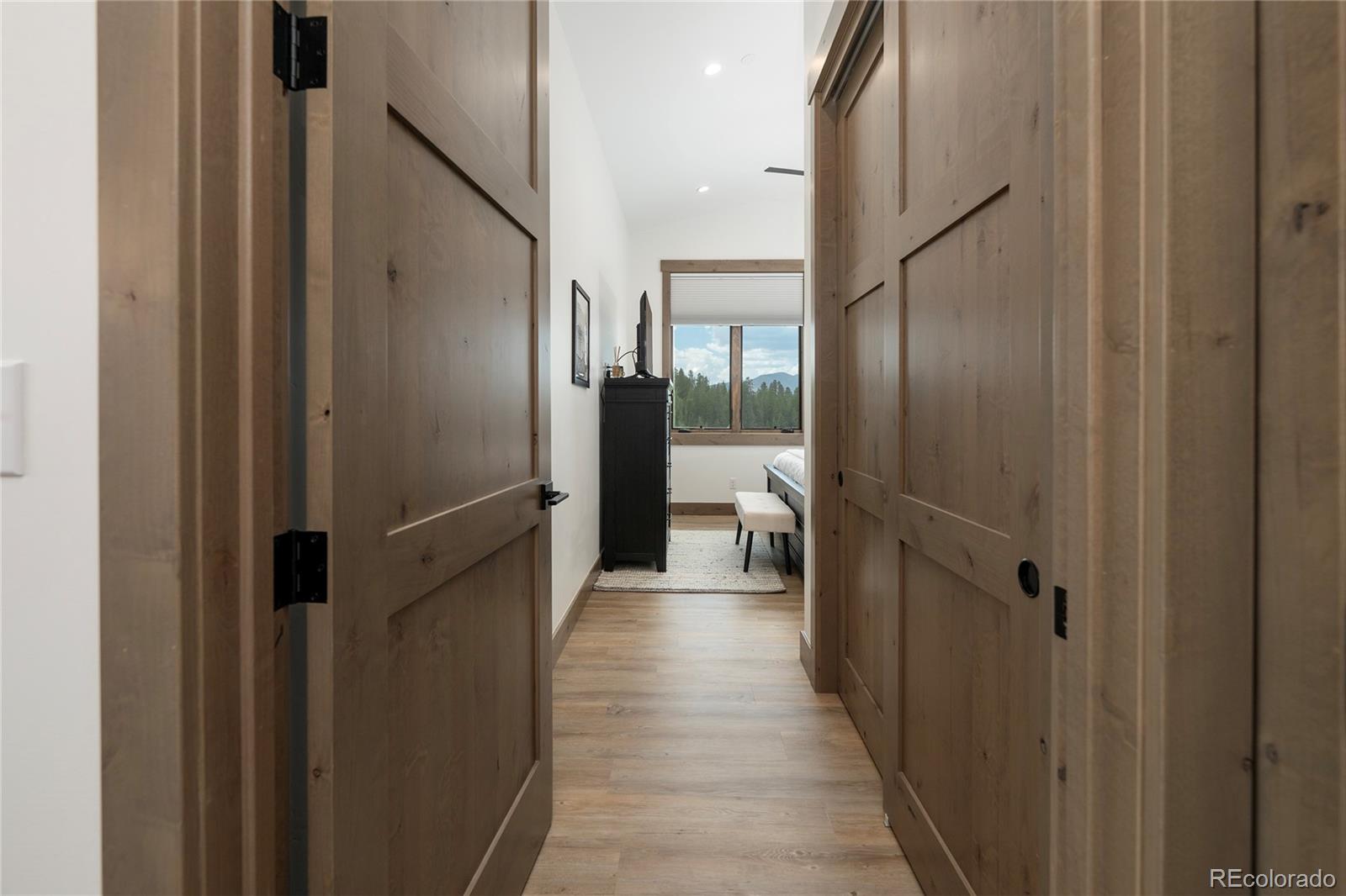 96 Meadow Trail, Unit G304 Fraser, CO 80442 - Photo 23 of 38 a view of a bathroom from a hallway