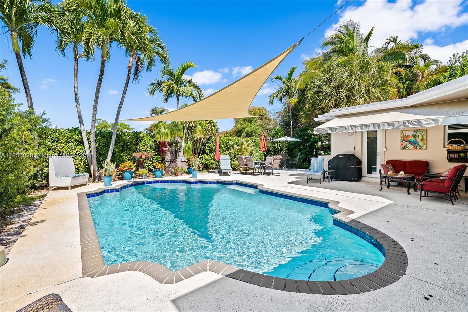 3731 Thomas Street Hollywood, FL 33021 - Photo 19 of 21 a view of a swimming pool with a patio