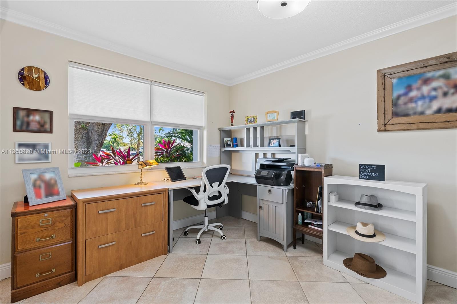 3731 Thomas Street Hollywood, FL 33021 - Photo 7 of 21 a view of a workspace with furniture and a window