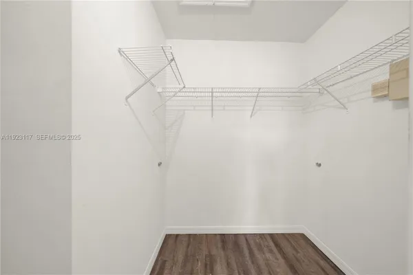 a view of a room with racks on the wall