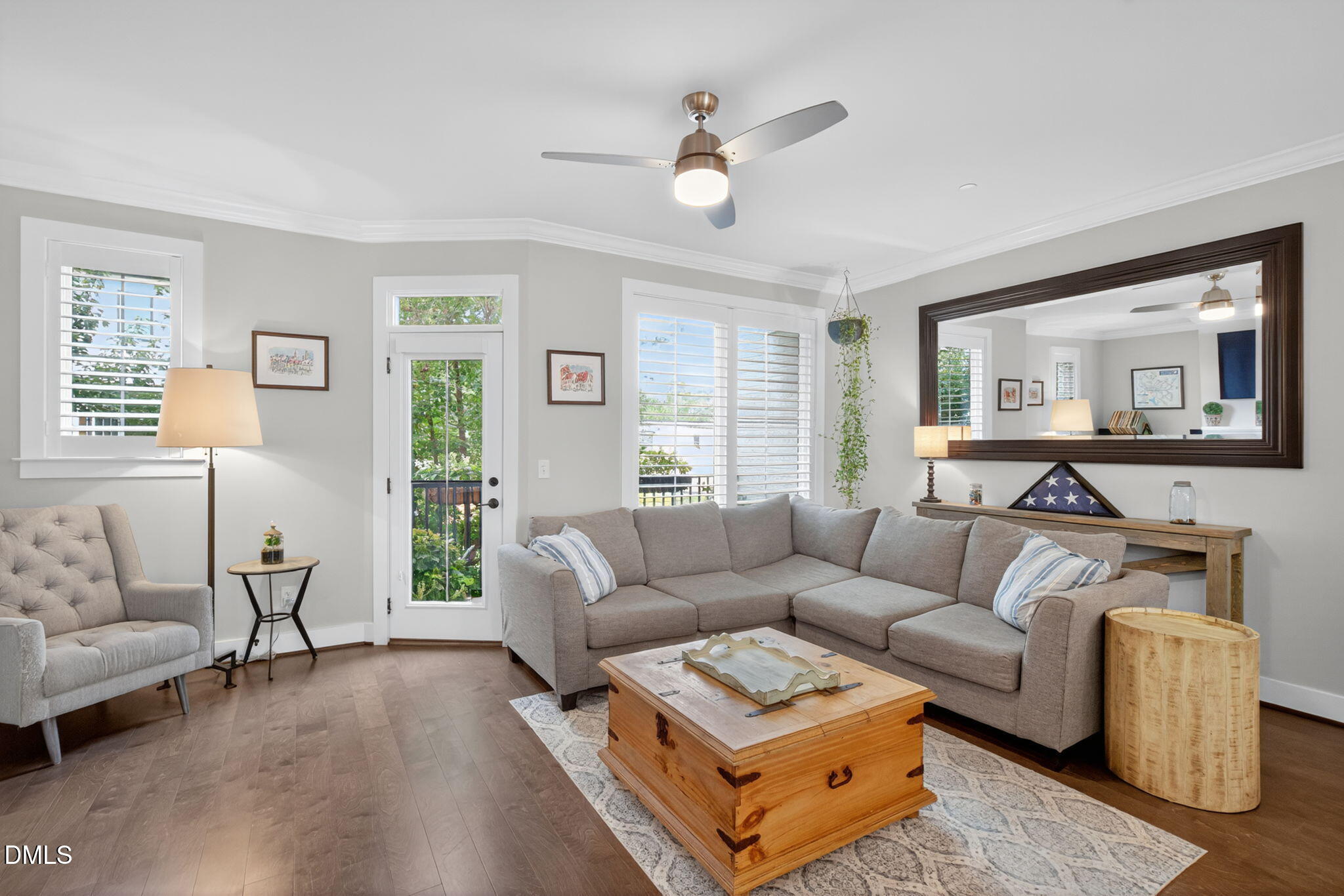 1610 Draper View Loop, Unit 102 Raleigh, NC 27608 - Photo 12 of 40 a living room with furniture and a large window