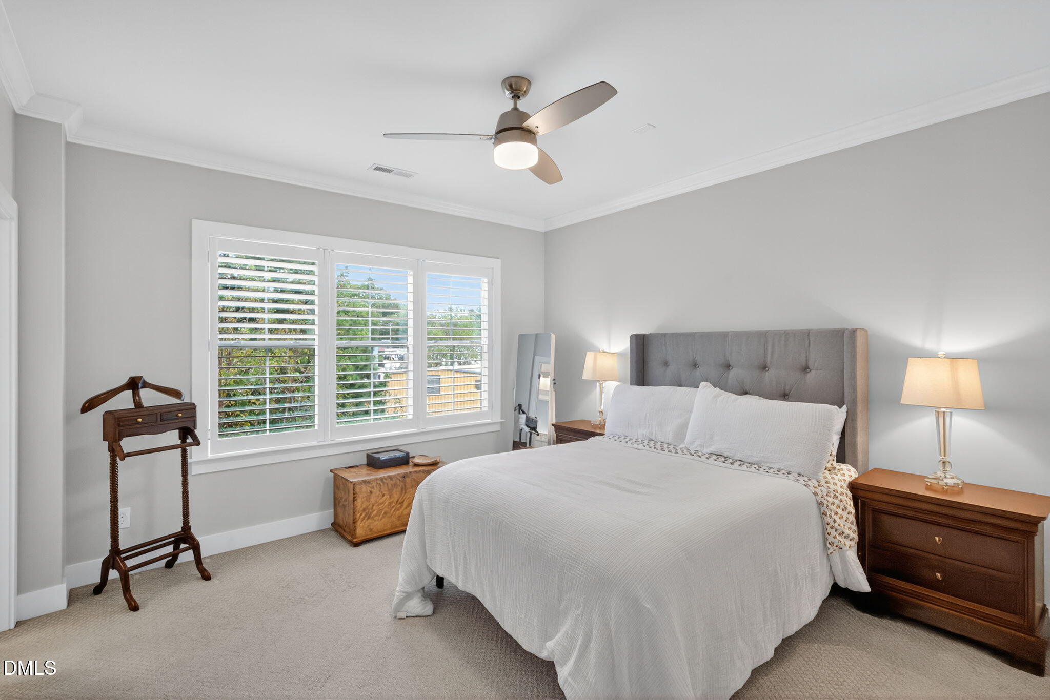 1610 Draper View Loop, Unit 102 Raleigh, NC 27608 - Photo 22 of 40 a bedroom with bed and window