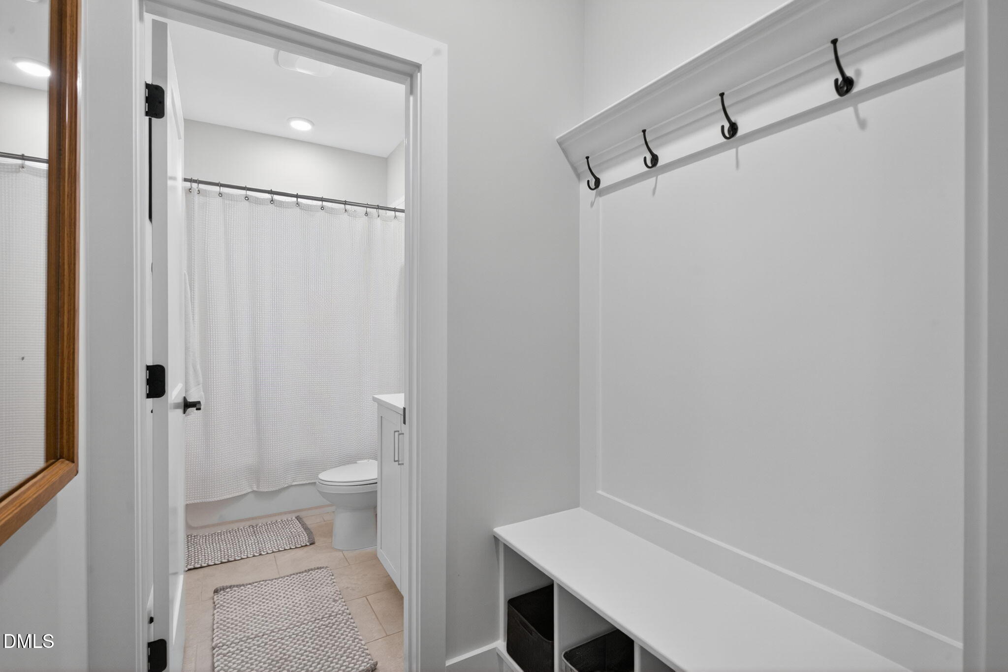 1610 Draper View Loop, Unit 102 Raleigh, NC 27608 - Photo 30 of 40 a bathroom with a sink and a toilet