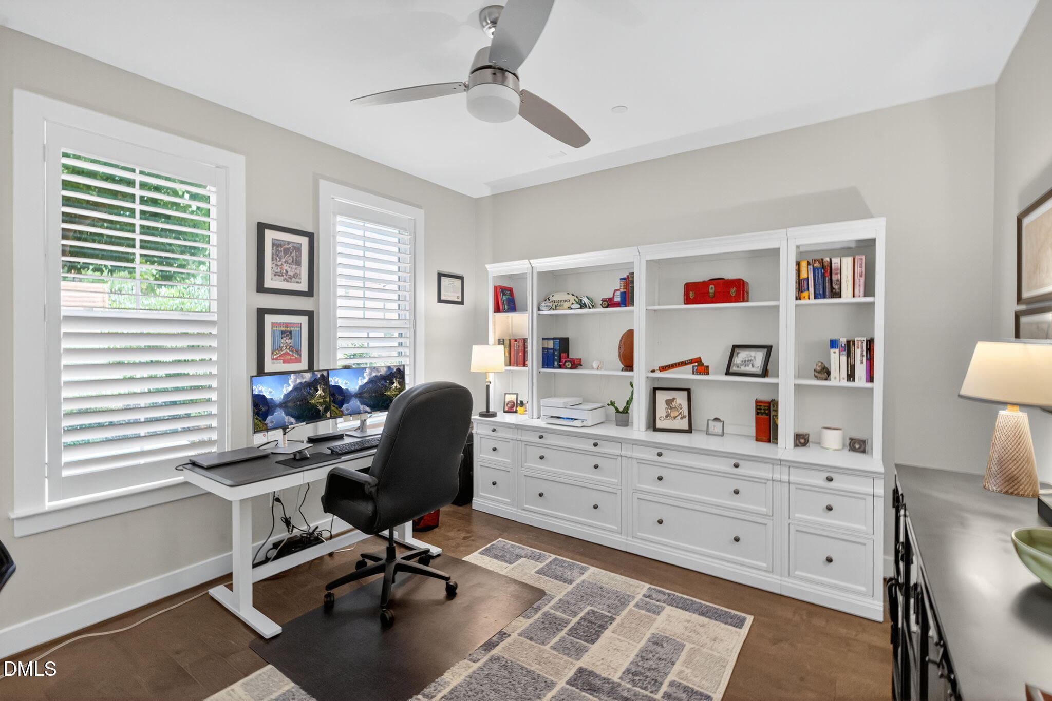 1610 Draper View Loop, Unit 102 Raleigh, NC 27608 - Photo 32 of 40 a view of a workspace with furniture and a window