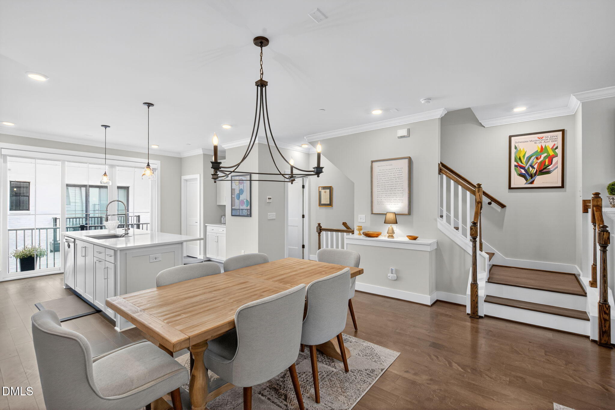 1610 Draper View Loop, Unit 102 Raleigh, NC 27608 - Photo 9 of 40 a dining room with furniture and wooden floor
