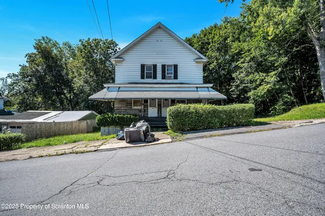 a view of house and outdoor space
