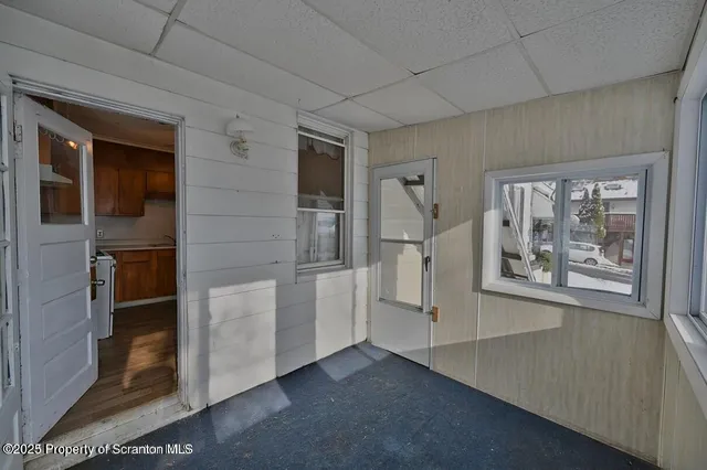 a view of a hallway with closet