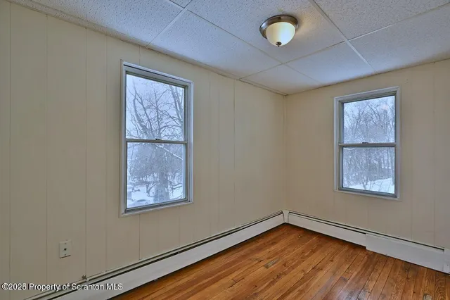 an empty room with windows