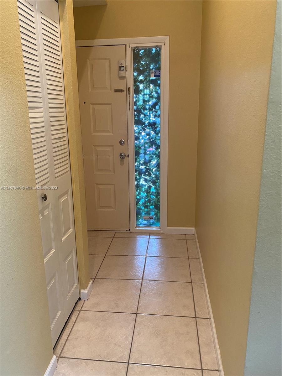 11652 Sunshine Pond Road Tampa, FL 33635 - Photo 5 of 39 a view of entryway with a window
