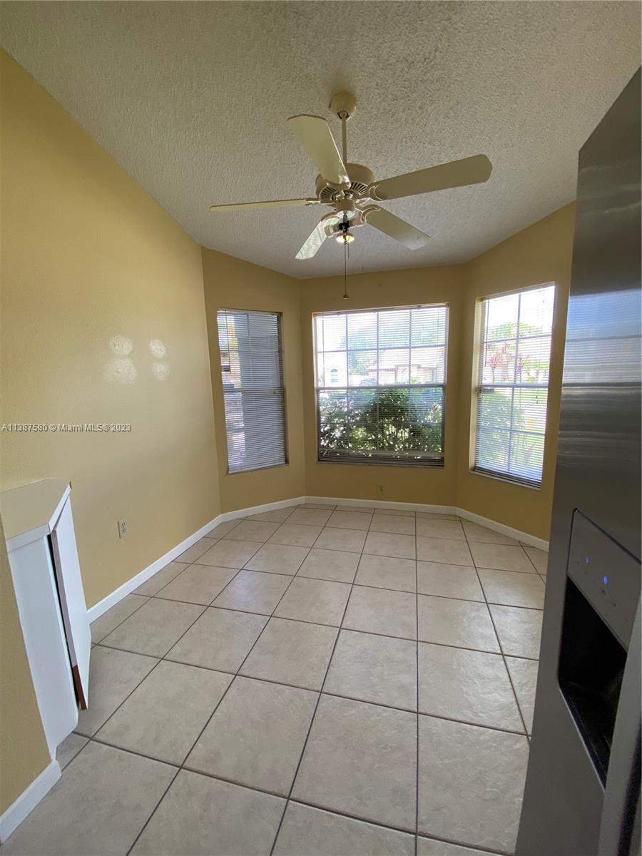 11652 Sunshine Pond Road Tampa, FL 33635 - Photo 8 of 39 a view of an empty room and window