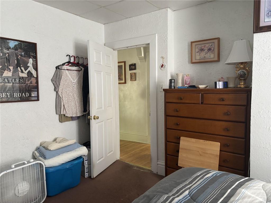 15 Grant Street Monongahela, PA 15063 - Photo 7 of 11 a bedroom with a bed and a mirror