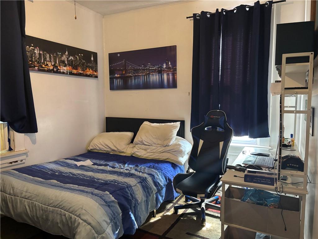 15 Grant Street Monongahela, PA 15063 - Photo 8 of 11 a bedroom with a bed and wooden floor