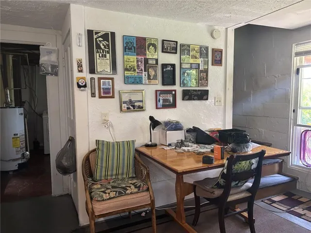 a view of a workspace with furniture