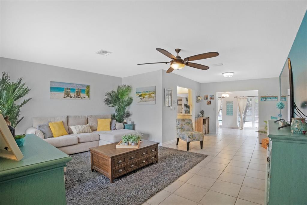 223 Southeast 7th Street Dania Beach, FL 33004 - Photo 25 of 50 a living room with furniture and wooden floor