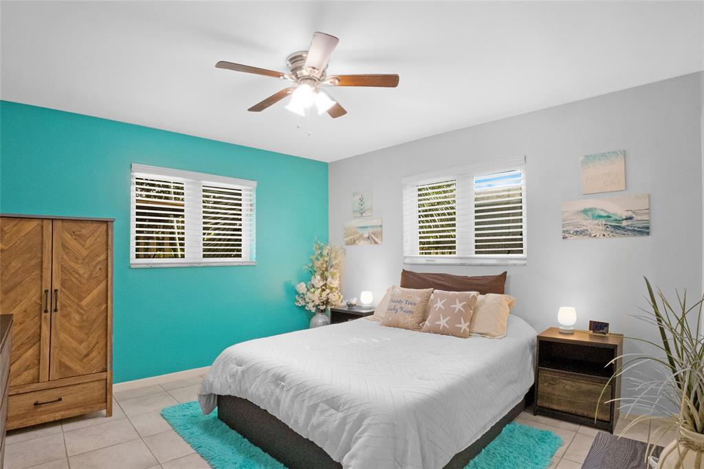 223 Southeast 7th Street Dania Beach, FL 33004 - Photo 31 of 50 a bedroom with a bed and window