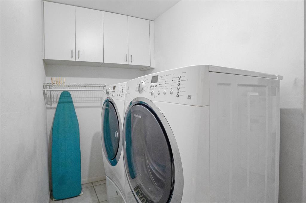 223 Southeast 7th Street Dania Beach, FL 33004 - Photo 35 of 50 a utility room with dryer and washer