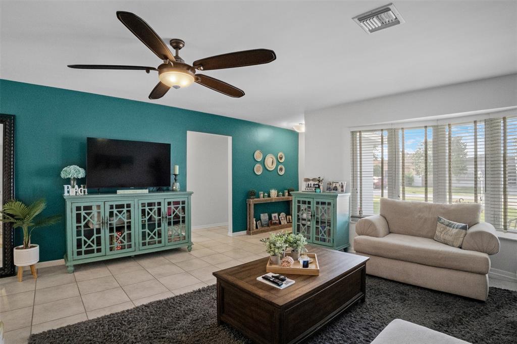 223 Southeast 7th Street Dania Beach, FL 33004 - Photo 10 of 50 a living room with furniture and a flat screen tv