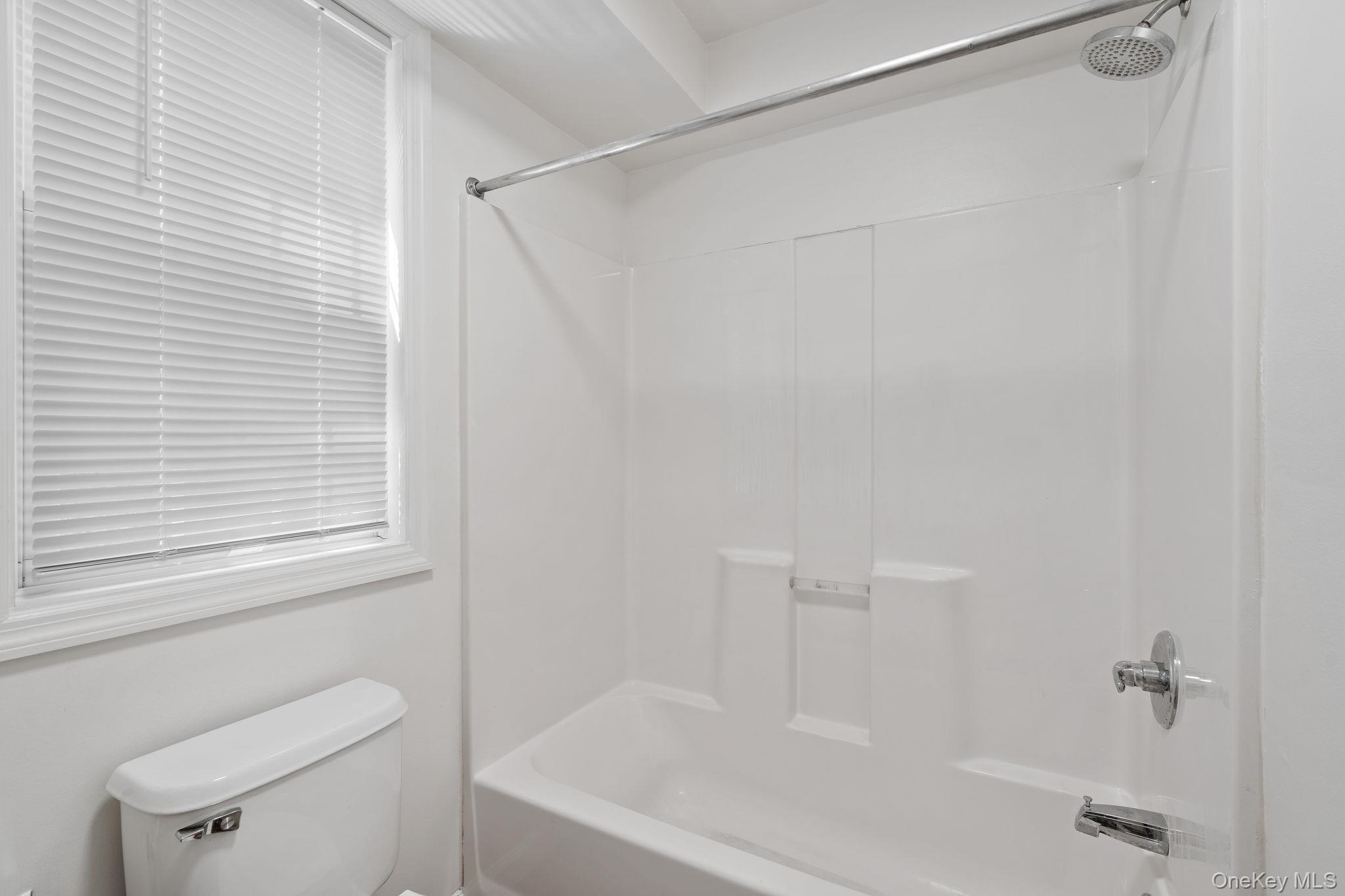 93 Delafield Street Poughkeepsie, NY 12601 - Photo 20 of 27 Bathroom featuring bathtub / shower combination