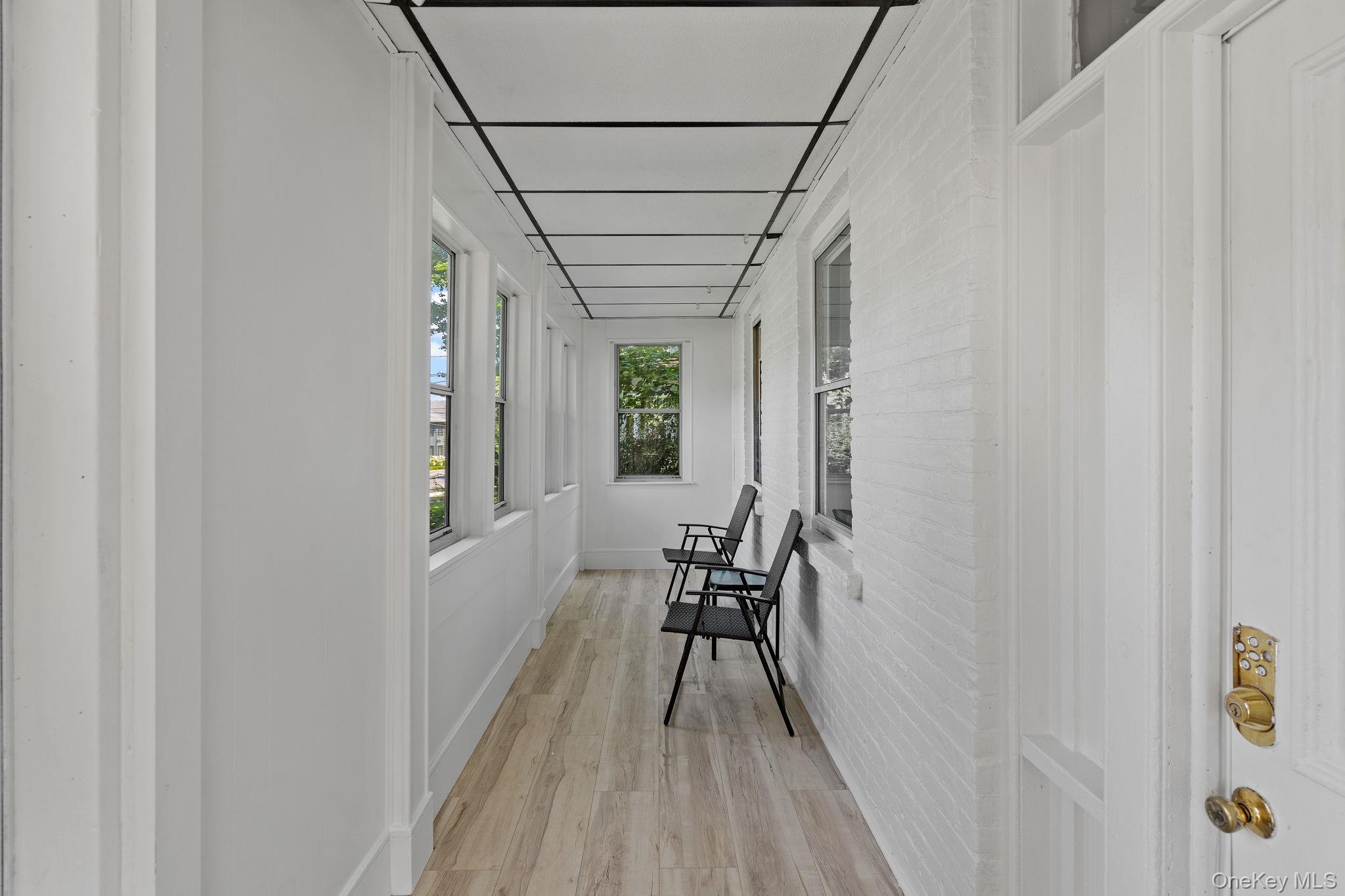 93 Delafield Street Poughkeepsie, NY 12601 - Photo 2 of 27 Corridor with light wood-style flooring