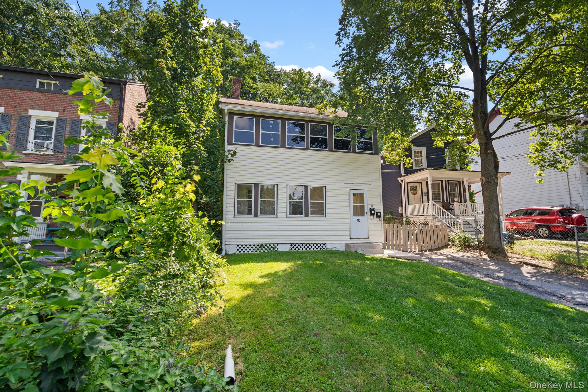 93 Delafield Street Poughkeepsie, NY 12601 - Photo 22 of 27 View of front facade featuring a chimney