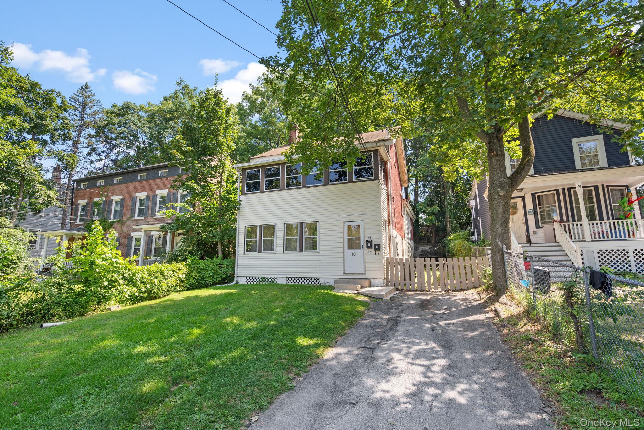93 Delafield Street Poughkeepsie, NY 12601 - Photo 23 of 27 View of front of house featuring a chimney