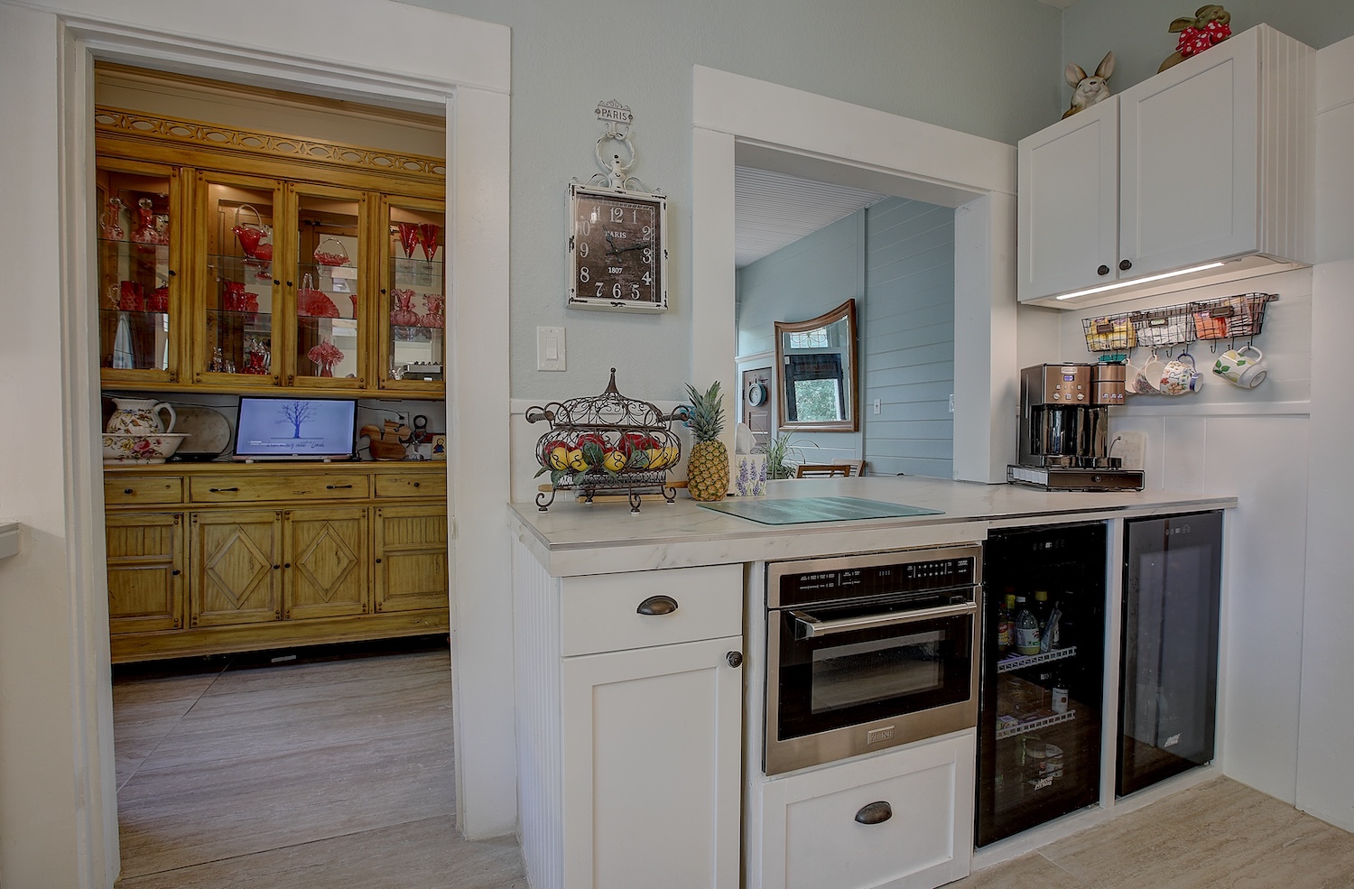 1903 South Austin Avenue Georgetown, TX 78626 - Photo 23 of 40 Kitchen has pass through to the breakfast room. Buffet in side foyer holds the pretty crystal collection, and conveys with the property.
