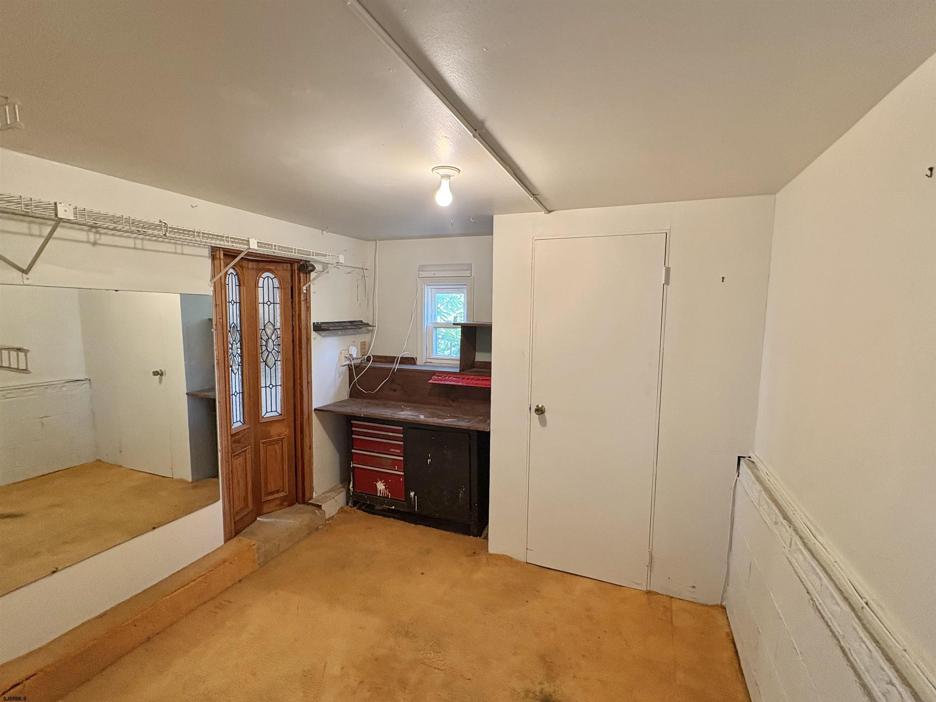 101 Haddon Road Somers Point, NJ 08244 - Photo 8 of 18 a view of livingroom with furniture and refrigerator